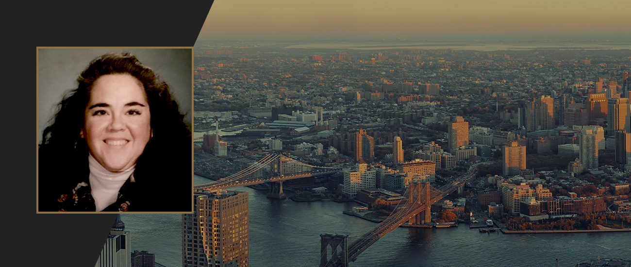 Photo of Kathleen E. McLaughlin above New Jersey Skyline